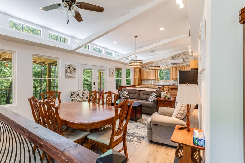 Great room with dining table and sofa