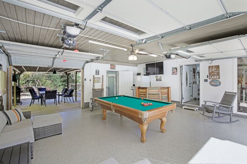 Garage game room with pool table
