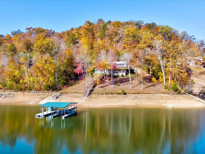 The point and dock from the water in fall
